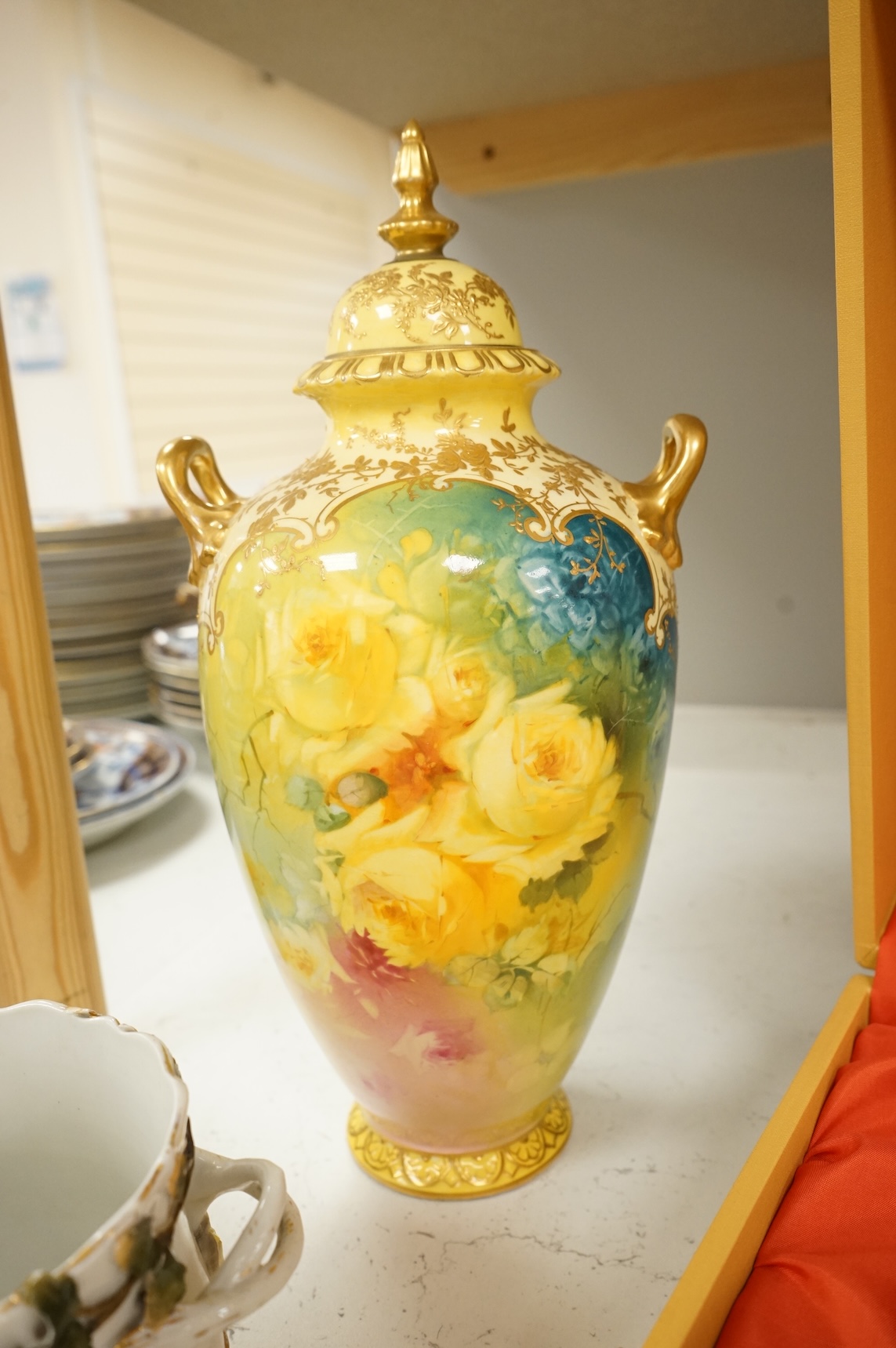 A pair of Bonn floral vases and covers, a modern Meissen vase, and an encrusted Sitzendorf vase, largest 35cm high
